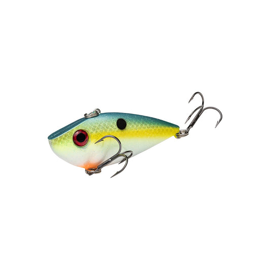 The Strike King Red Eye Shad 2.5" 1/2oz., by Strike King, is a colorful lipless crankbait featuring a blue-green top, yellow sides, red eye spot, and two treble hooks attached to its underside and tail.