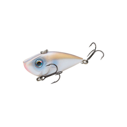 The Strike King Red Eye Shad Lipless Crankbait 1/2oz is a fish-shaped lure with a white and light pink body, blue eye design, and two metal treble hooks—one underneath and one at the tail.
