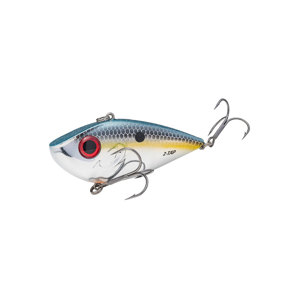 The Strike King Red Eye Shad Tungsten 2 Tap Lipless Crankbait 3/4oz. by Strike King is a fish-shaped lure with a silver and blue body, red and black eye, black spots, and two treble hooks—one underneath and one at the tail.