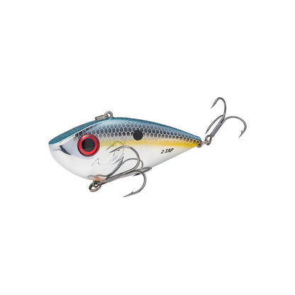 The Strike King Red Eye Shad Tungsten 2 Tap Lipless Crankbait 3/4oz. by Strike King is a fish-shaped lure with a silver and blue body, red and black eye, black spots, and two treble hooks—one underneath and one at the tail.