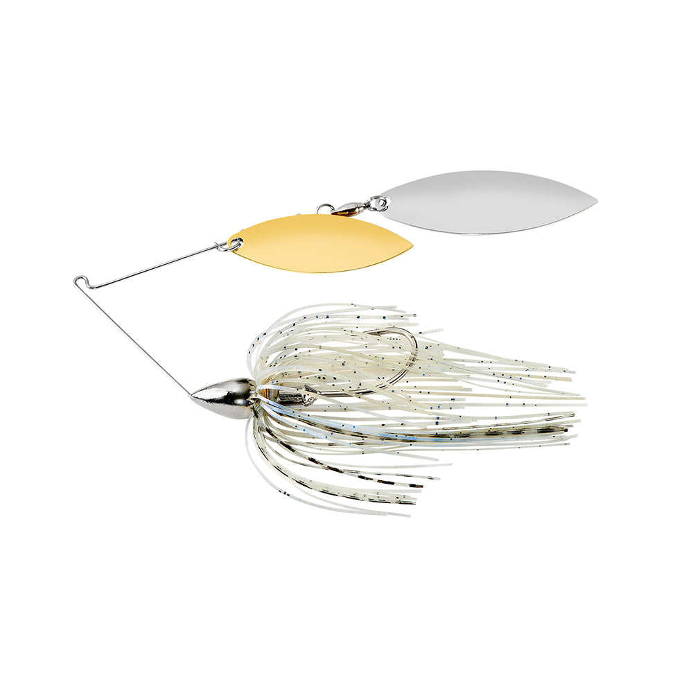 The War Eagle Nickel Double Willow Spinnerbait by War Eagle features silver and gold blades, a metal wire arm, and a skirt of white and silver strands to attract fish by reflecting light and creating lifelike movement in the water.