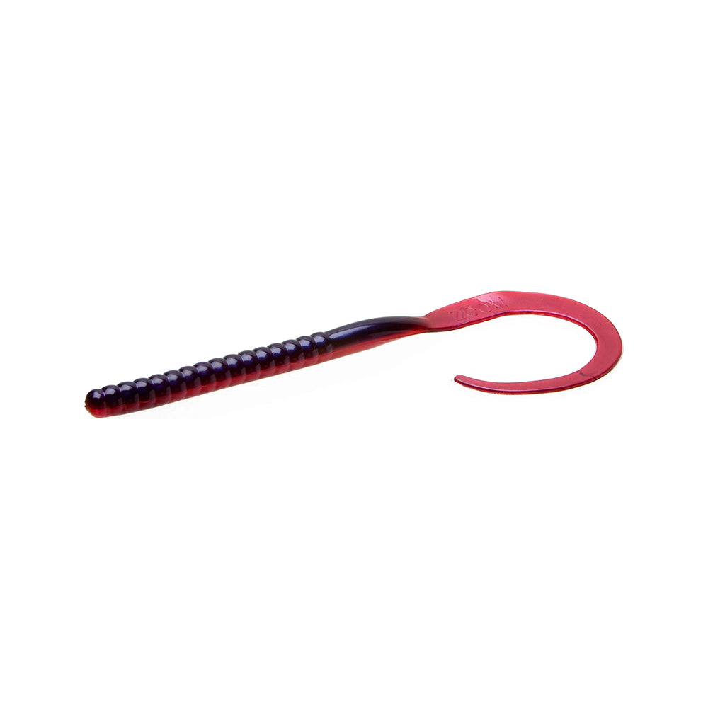 The Zoom Ol Monster Worm by Zoom is a red, soft plastic 10.5" lure with a ribbed straight body and large curly tail, designed to mimic a worm or grub for bass fishing. The lure is displayed on a plain white background.